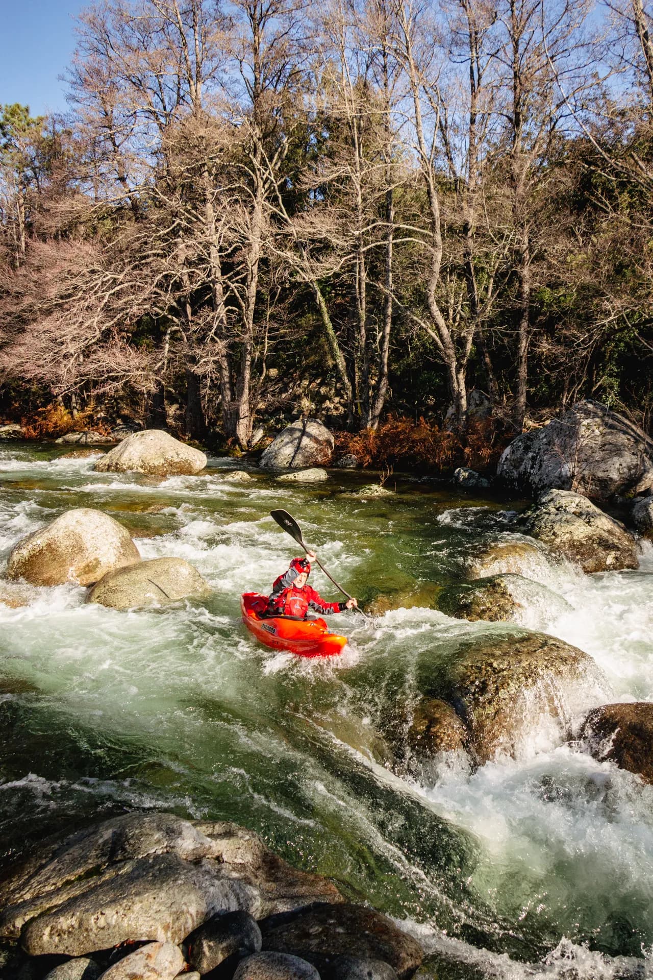 Kayaker on the Tavignano river at Camping Ernella